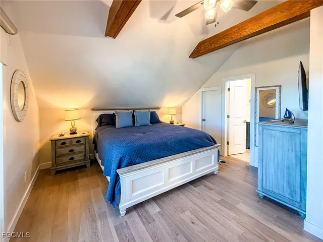 a bathroom with a sink vanity granite and a mirror