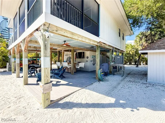 a view of entryway and wooden floor