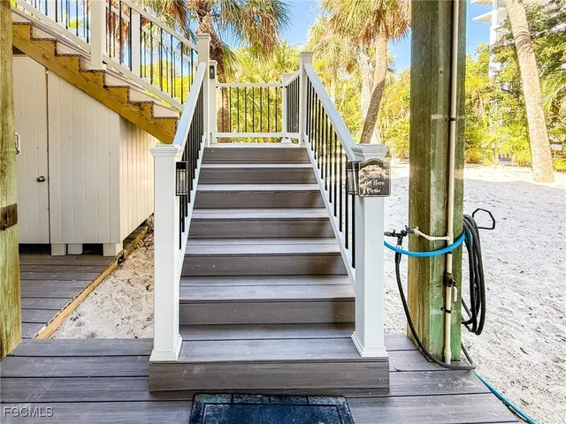 a view of a lake with houses in the back