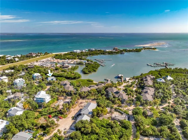 a view of a swimming pool with sitting area