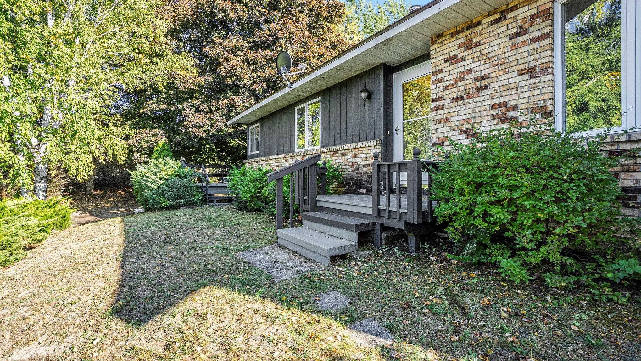 1068 Carlisle Road Traverse City, MI 49696 - Photo 1 of 30 1928103-27545936-4c39-42aa-ad61-5c5f74135984.JPG