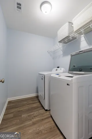 a bedroom with a bed and a ceiling fan