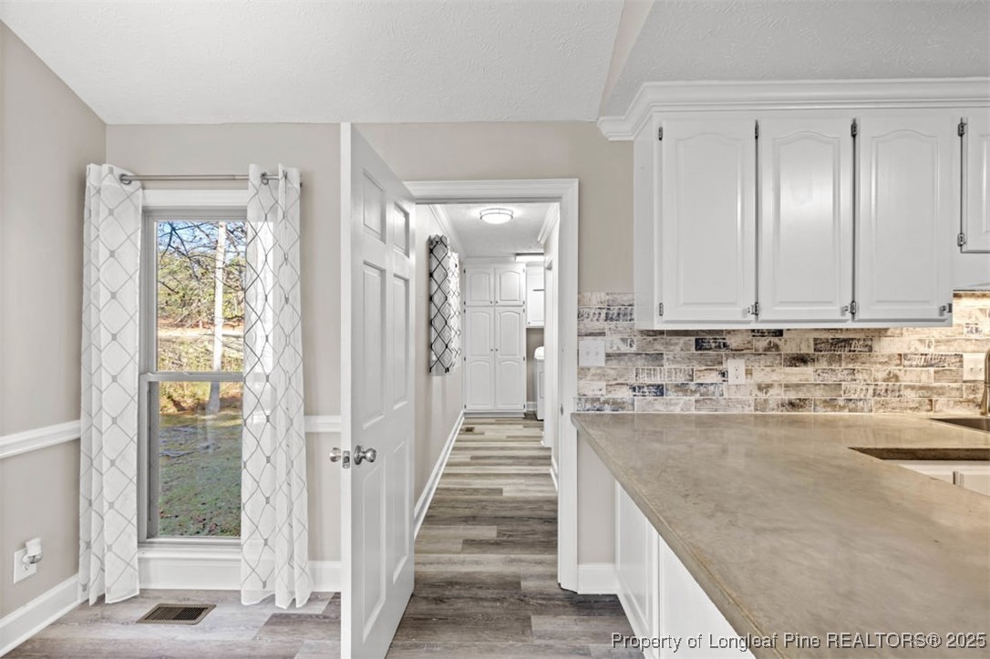 6922 South Staff Road Fayetteville, NC 28306 - Photo 12 of 45 a view of a kitchen from the hallway