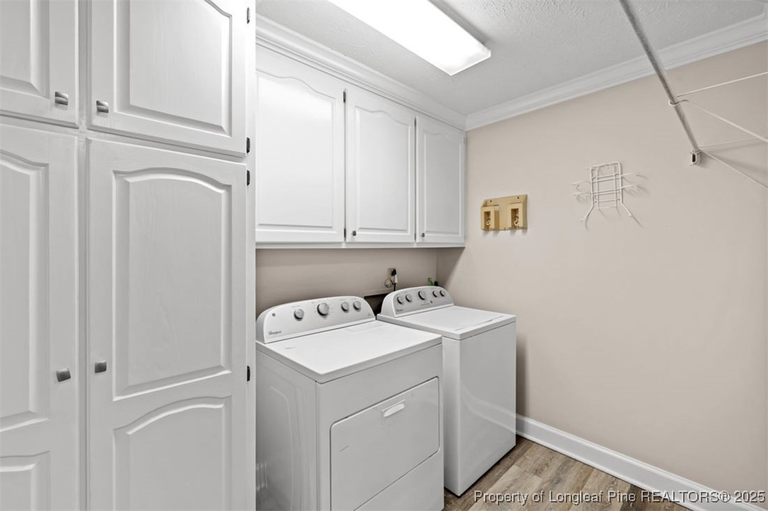 6922 South Staff Road Fayetteville, NC 28306 - Photo 13 of 45 a utility room with dryer and washer