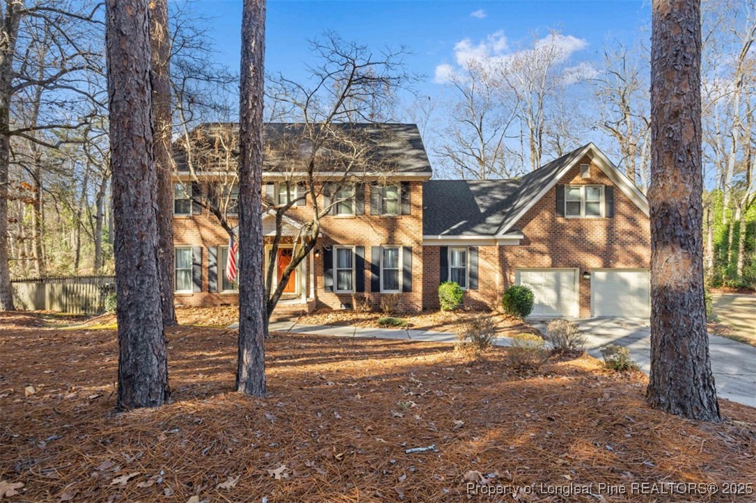 6922 South Staff Road Fayetteville, NC 28306 - Photo 2 of 45 a view of street along with trees