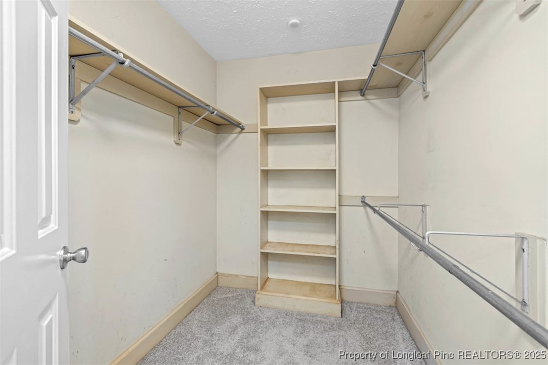 6922 South Staff Road Fayetteville, NC 28306 - Photo 21 of 45 a view of an empty walk in closet