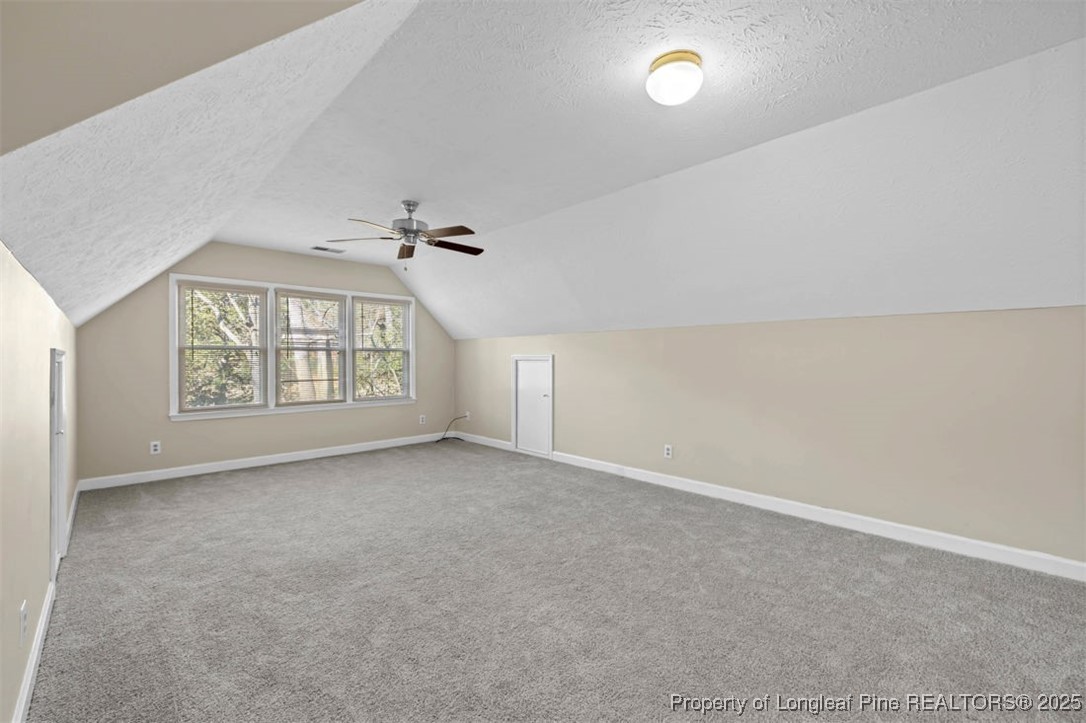 6922 South Staff Road Fayetteville, NC 28306 - Photo 33 of 45 an empty room with windows and fan