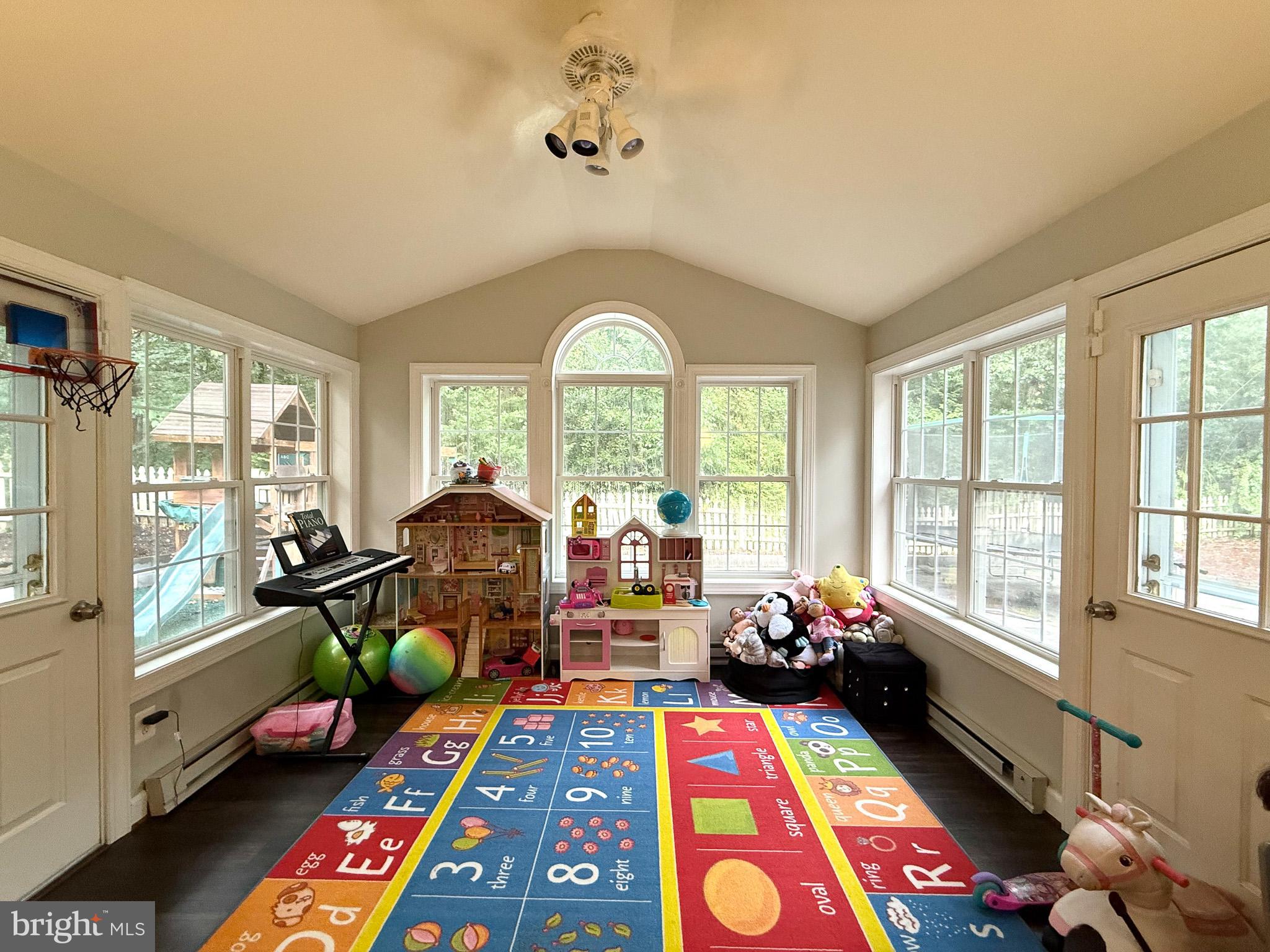 6421 Spring Lake Drive Burke, VA 22015 - Photo 21 of 65 a living room filled with furniture and a table
