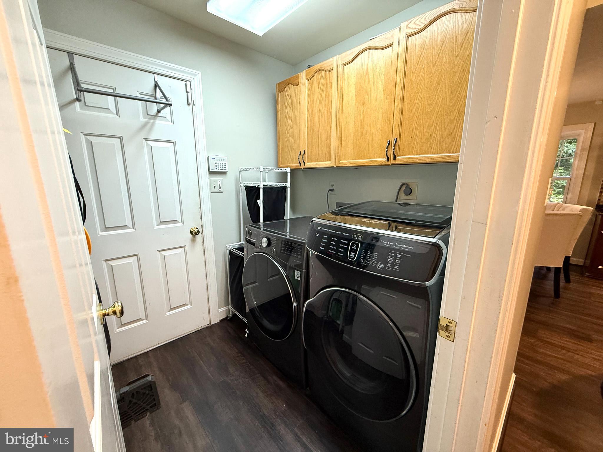 6421 Spring Lake Drive Burke, VA 22015 - Photo 23 of 65 a view of a utility room with washer and dryer
