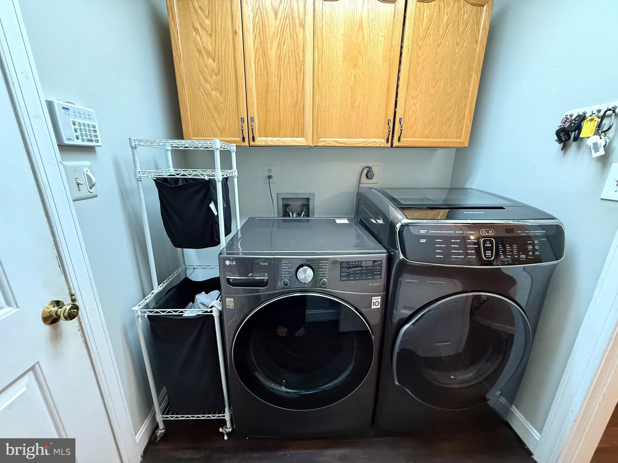 6421 Spring Lake Drive Burke, VA 22015 - Photo 24 of 65 a utility room with dryer and washer