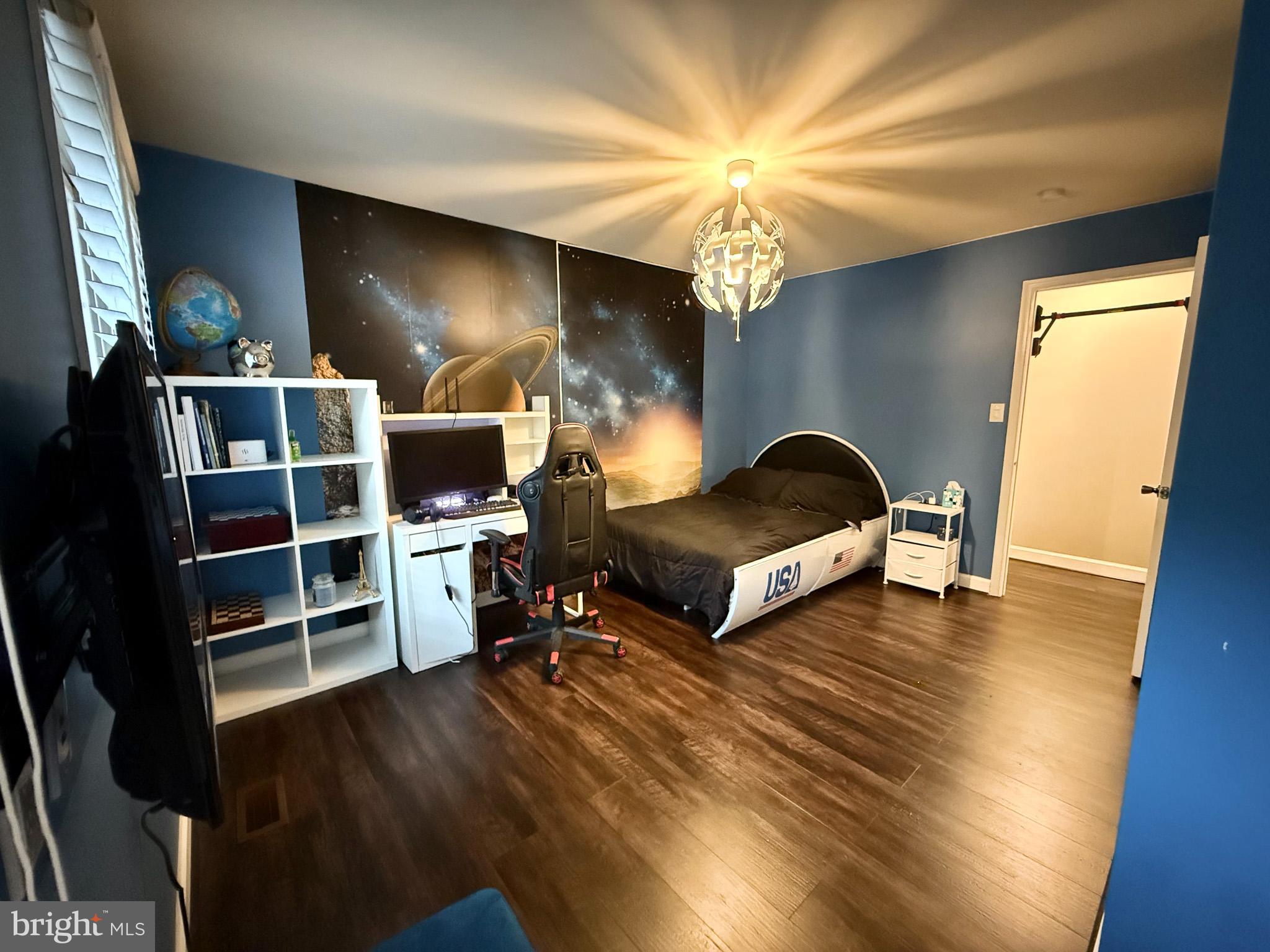 6421 Spring Lake Drive Burke, VA 22015 - Photo 44 of 65 a living room with furniture and a flat screen tv