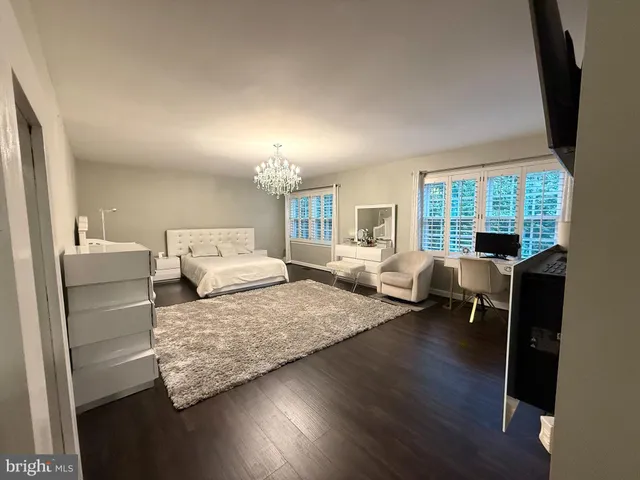 a bathroom with a double vanity sink and mirror
