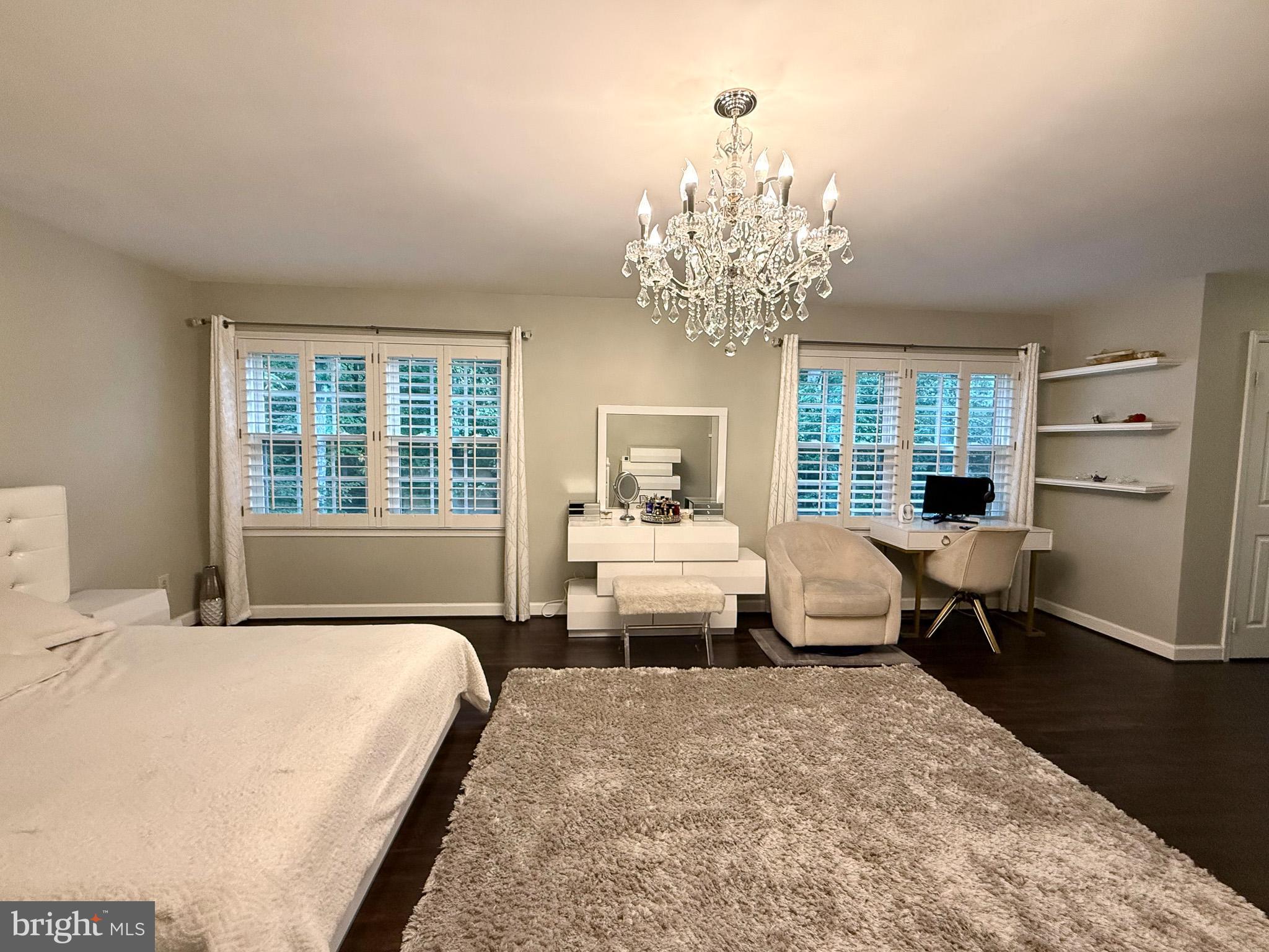 6421 Spring Lake Drive Burke, VA 22015 - Photo 47 of 65 a bedroom with a large bed and a window