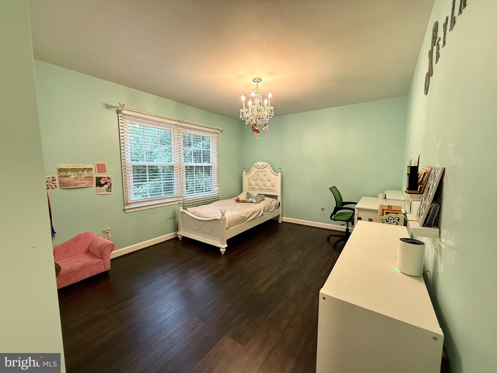 6421 Spring Lake Drive Burke, VA 22015 - Photo 56 of 65 a living room with furniture and a fireplace