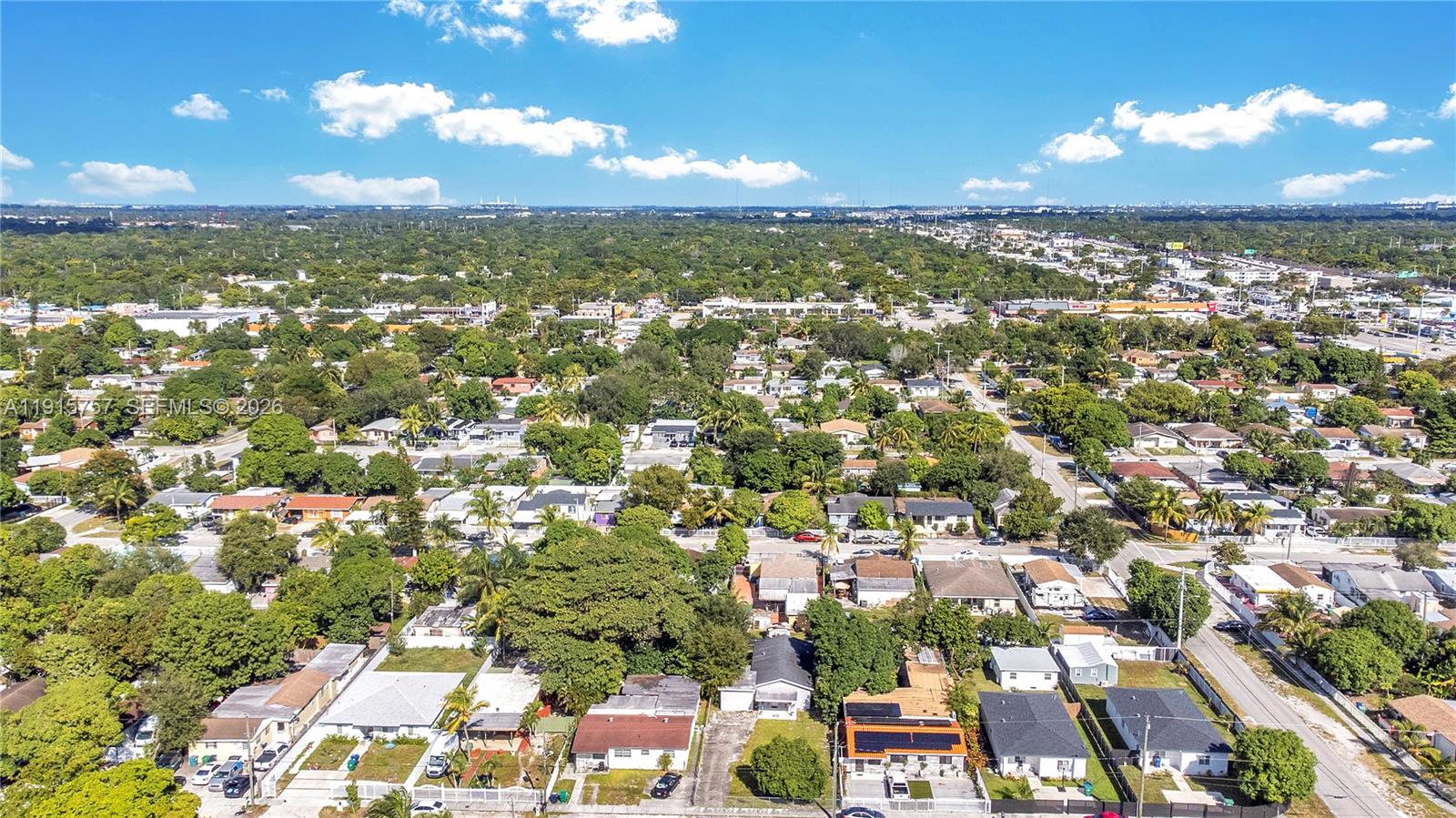 827 Northwest 114th Street Miami, FL 33168 - Photo 22 of 23 an aerial view of residential houses with city view