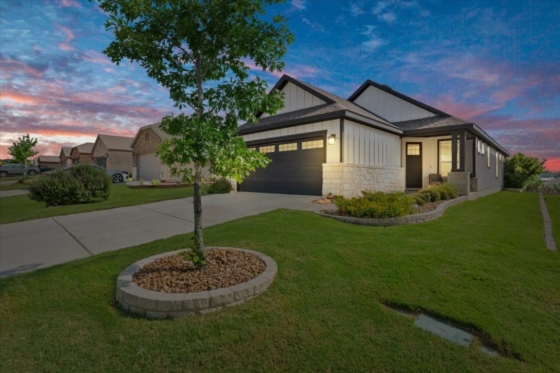 a house that has tree in front of it