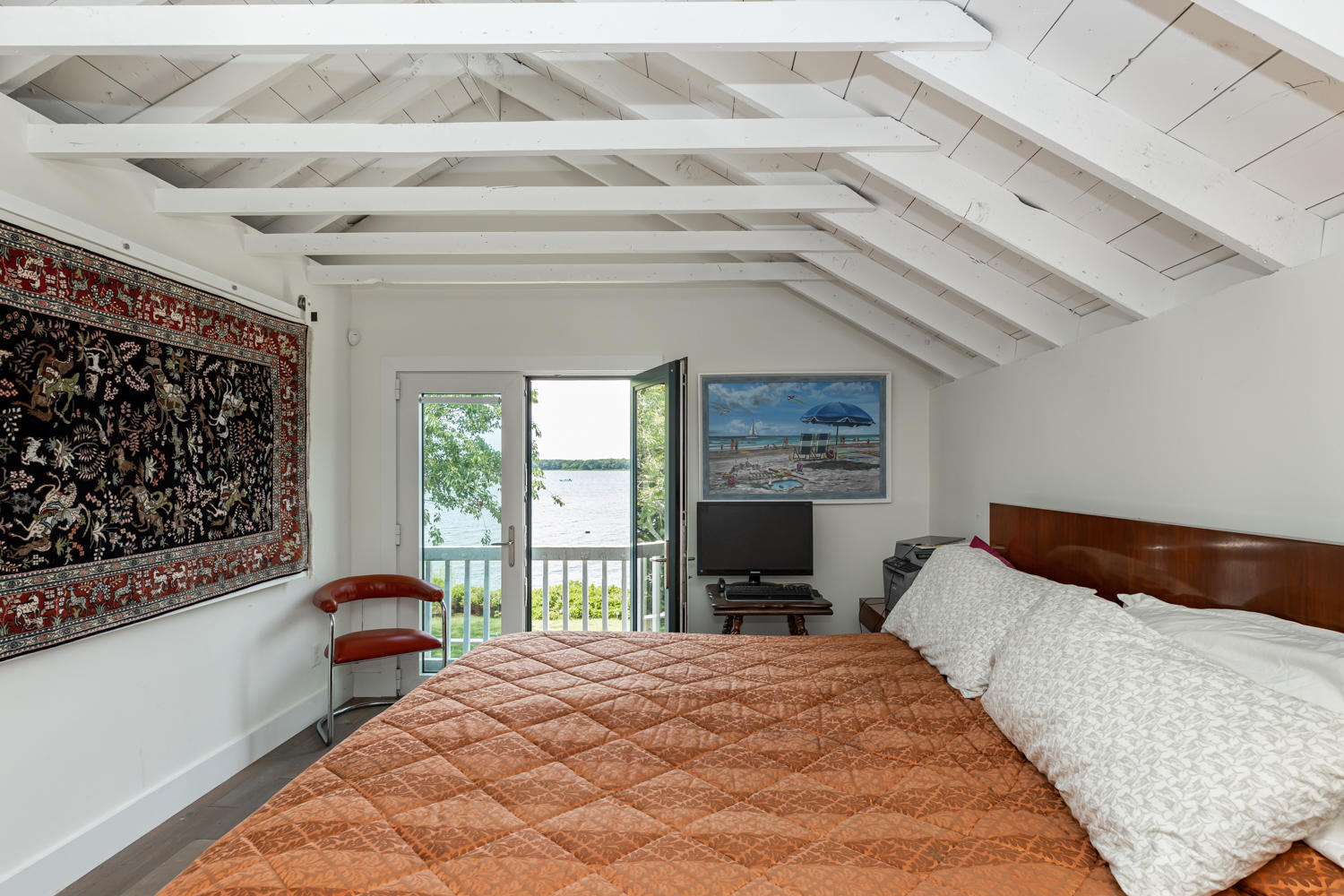 37 Seconsett Point Road Mashpee, MA 02649 - Photo 13 of 28 a bedroom with a bed and a large window