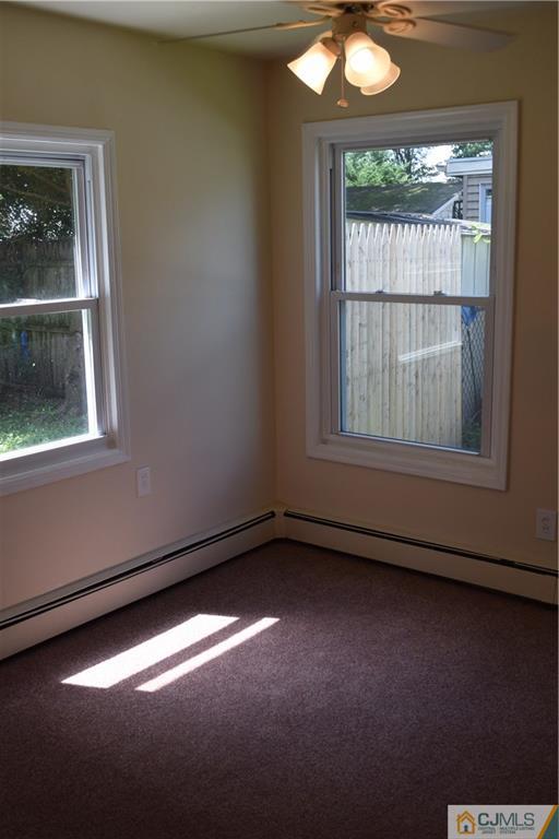 18 Mercury Road Edison, NJ 08817 - Photo 14 of 23 a view of an empty room with a window