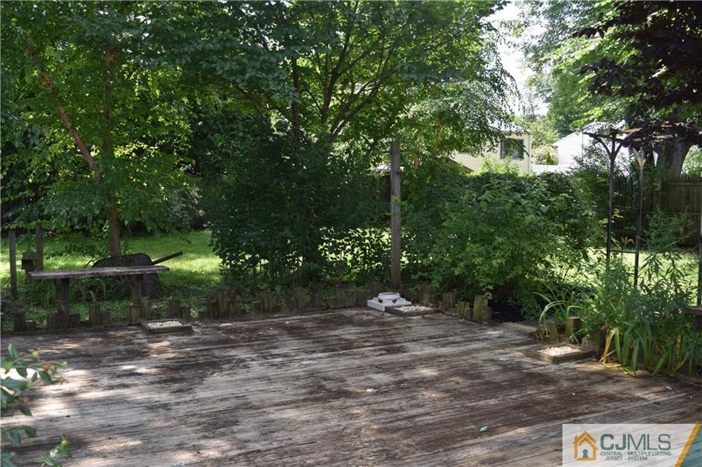 18 Mercury Road Edison, NJ 08817 - Photo 22 of 23 a view of a street with a trees