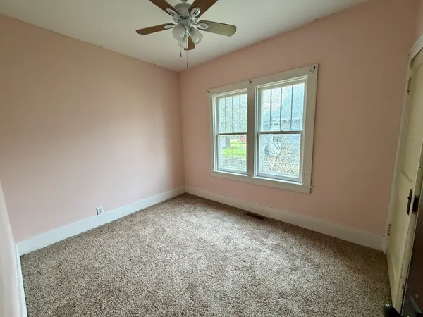 an empty room with a window