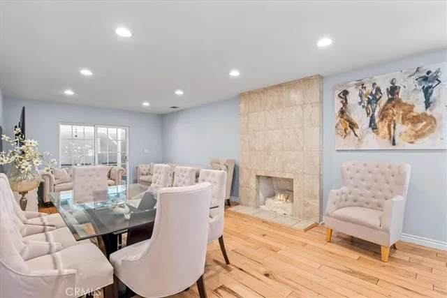 a view of a livingroom with furniture and wooden floor