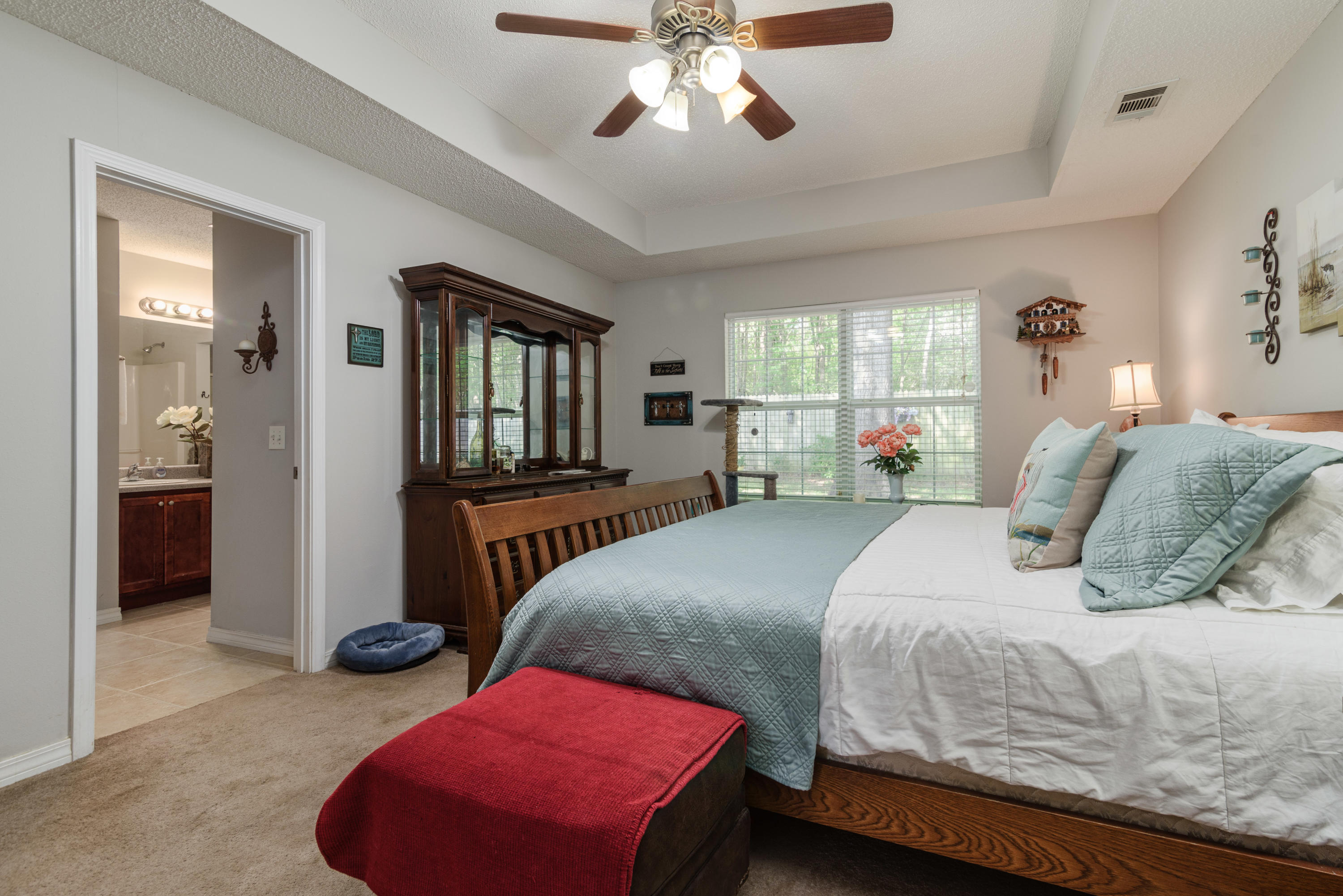 205 Tiffot Court Crestview, FL 32539 - Photo 17 of 32 a bedroom with a bed window and a dresser