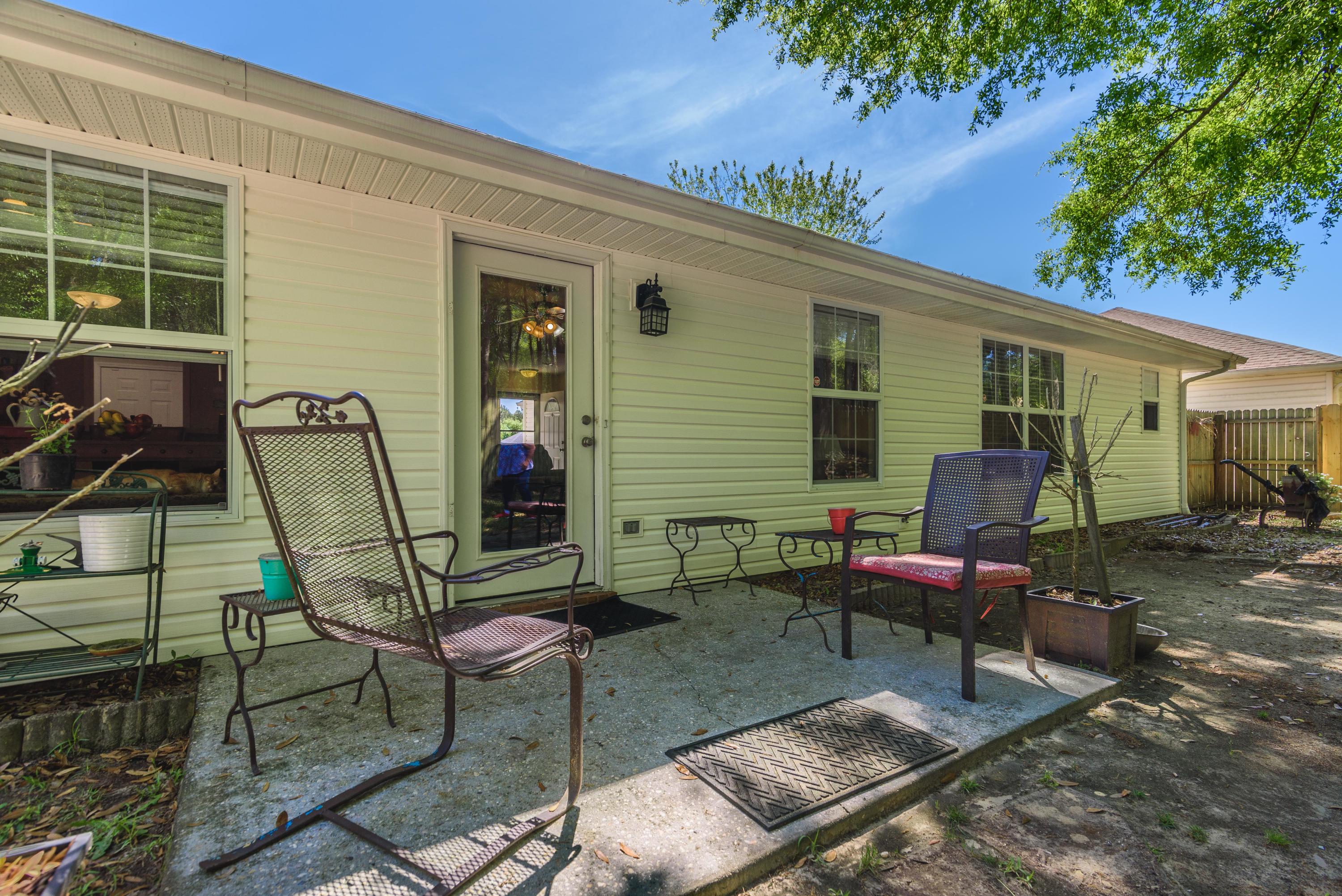 205 Tiffot Court Crestview, FL 32539 - Photo 29 of 32 a view of a two chairs in the patio
