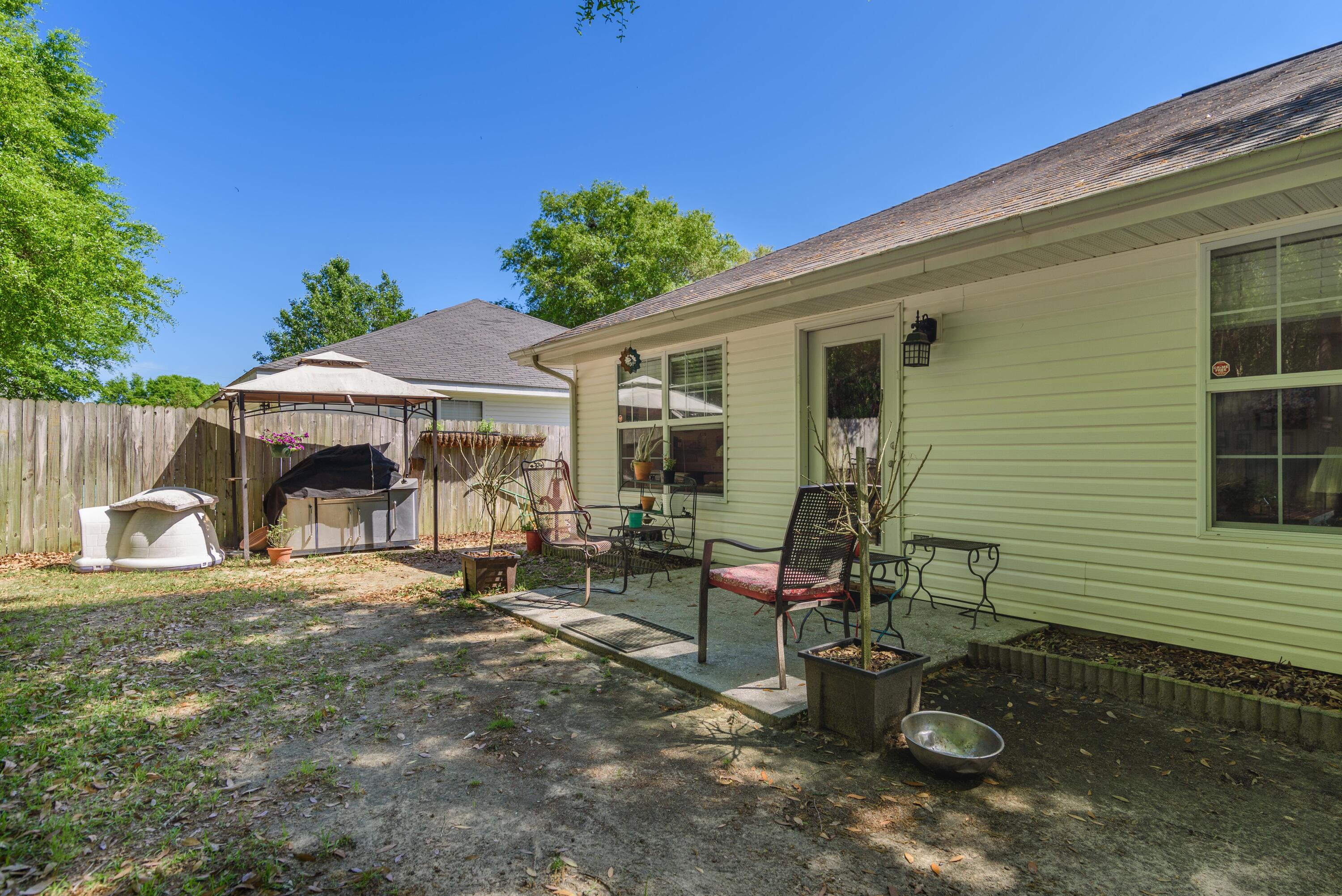 205 Tiffot Court Crestview, FL 32539 - Photo 32 of 32 a view of a house with patio
