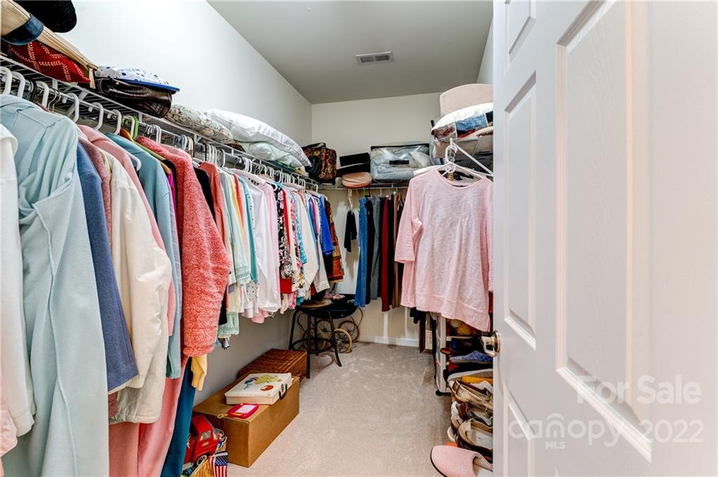 608 Amethyst Circle Fort Mill, SC 29708 - Photo 14 of 28 a view of walk in closet with clothes and shoes