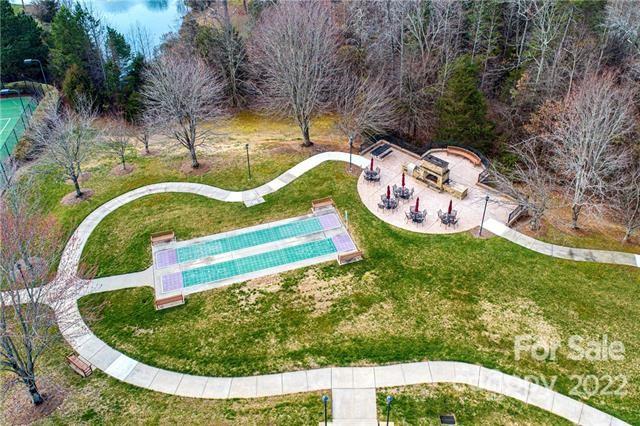608 Amethyst Circle Fort Mill, SC 29708 - Photo 24 of 28 a view of a swimming pool with a garden