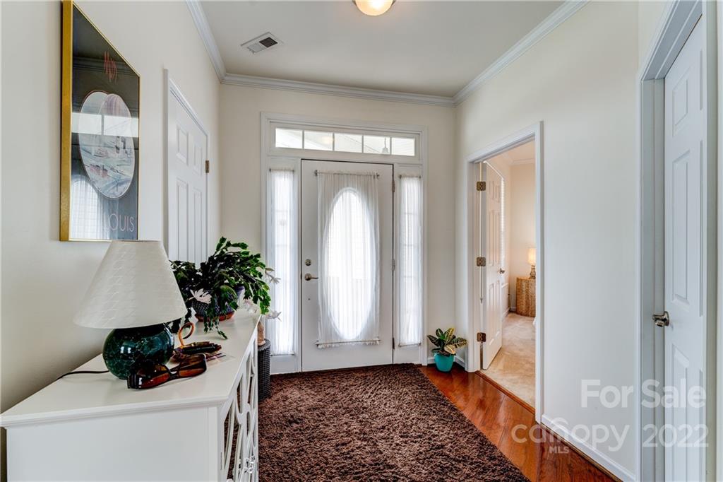 608 Amethyst Circle Fort Mill, SC 29708 - Photo 3 of 28 a view of an entryway with wooden floor and a rug