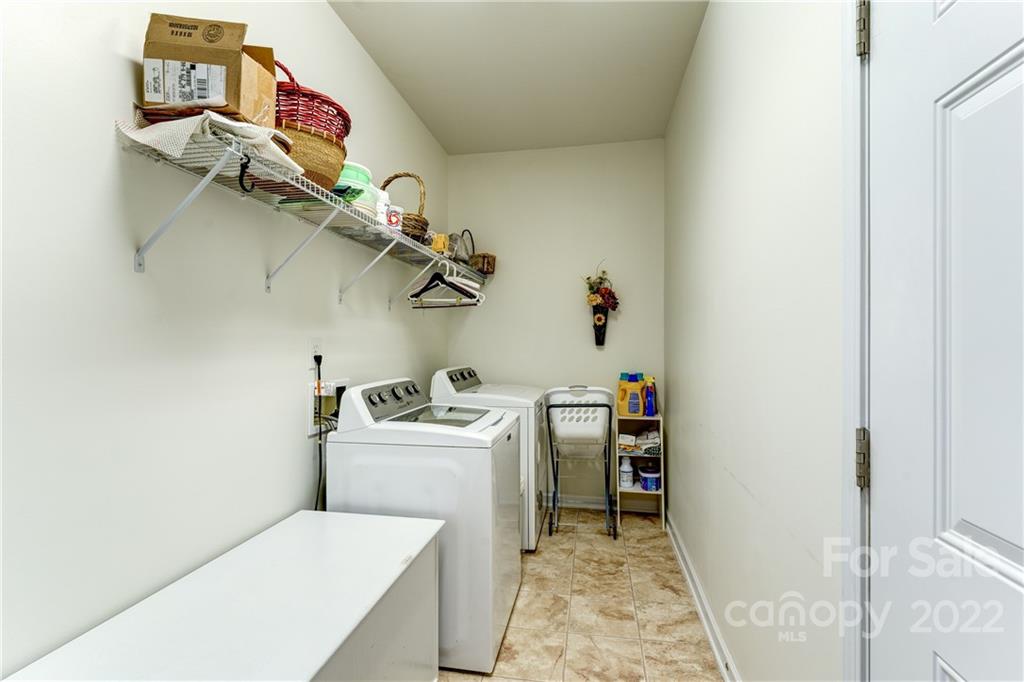 608 Amethyst Circle Fort Mill, SC 29708 - Photo 7 of 28 a utility room with dryer and washer