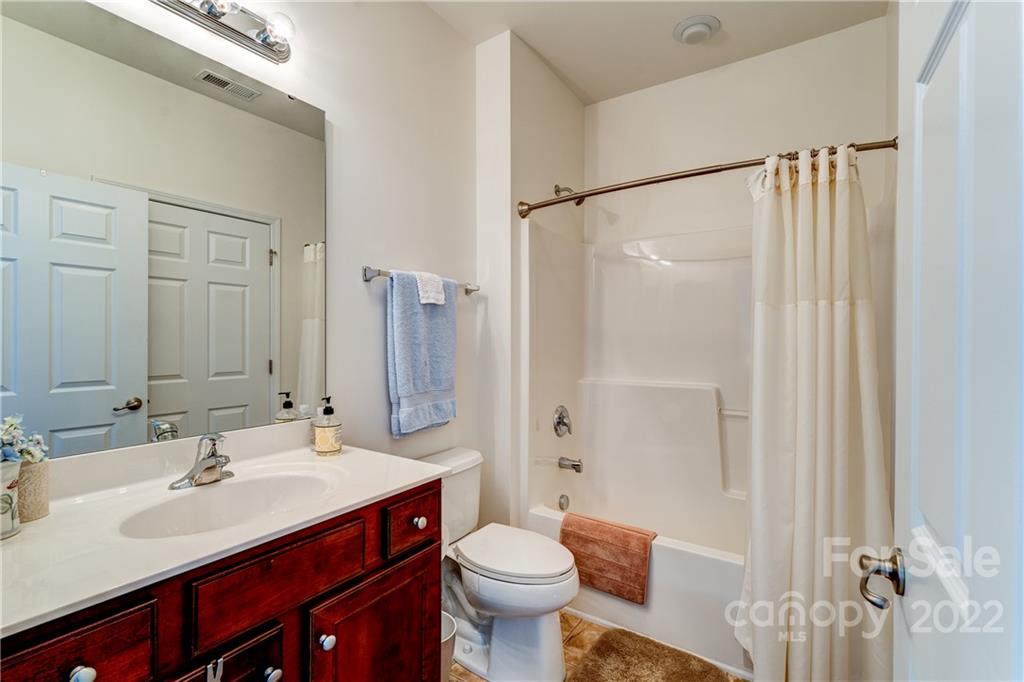 608 Amethyst Circle Fort Mill, SC 29708 - Photo 9 of 28 a bathroom with a sink toilet and shower