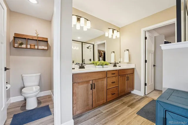 a front view of a house with a yard table and chairs