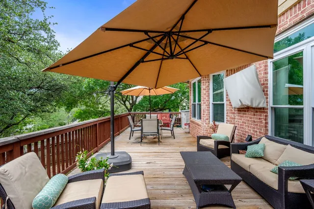 a view of sitting area with furniture and wooden floor