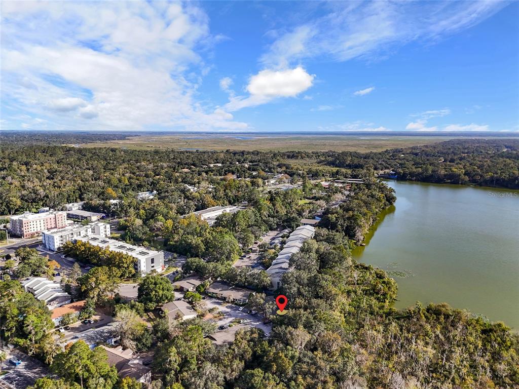 2490 Southwest 14th Drive, Unit 23 Gainesville, FL 32608 - Photo 2 of 14 an aerial view of a city