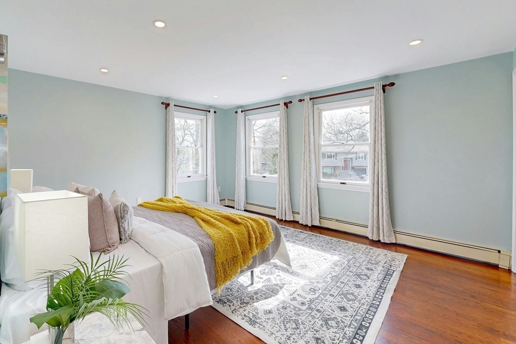 1 Hodge Road Arlington, MA 02474 - Photo 17 of 39 a bedroom with a bed and a window