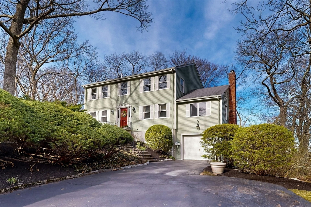 1 Hodge Road Arlington, MA 02474 - Photo 2 of 39 a front view of a house with garden