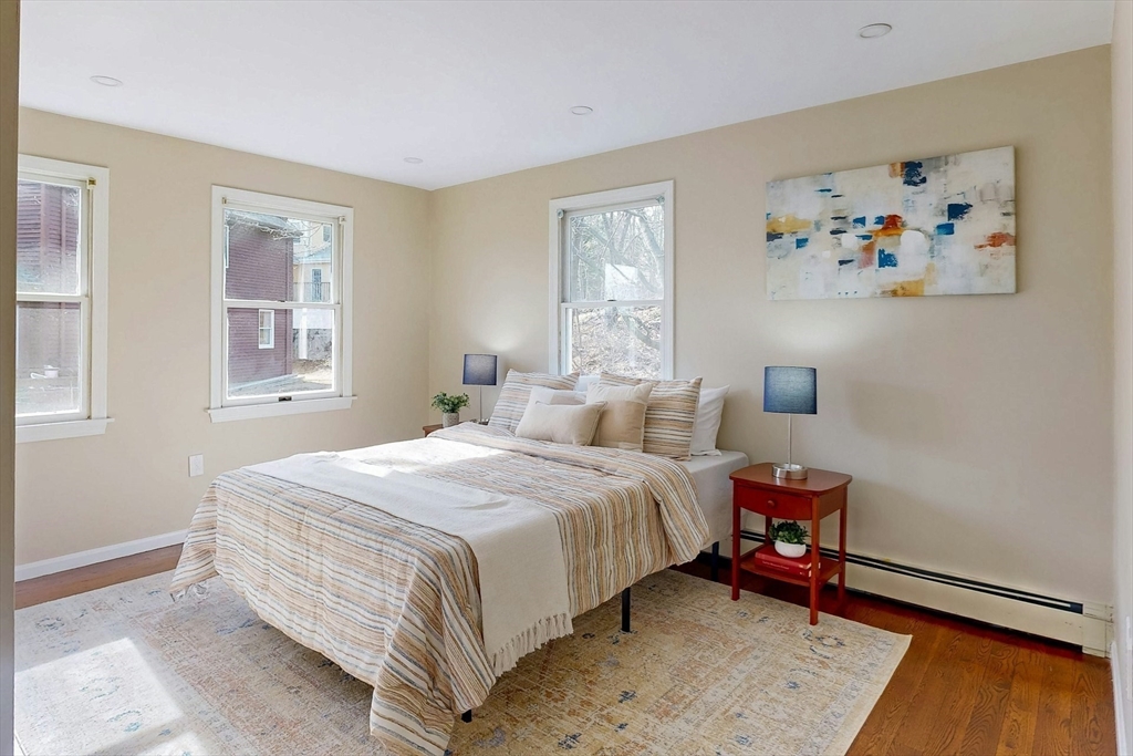 1 Hodge Road Arlington, MA 02474 - Photo 26 of 39 a bedroom with a bed and a window