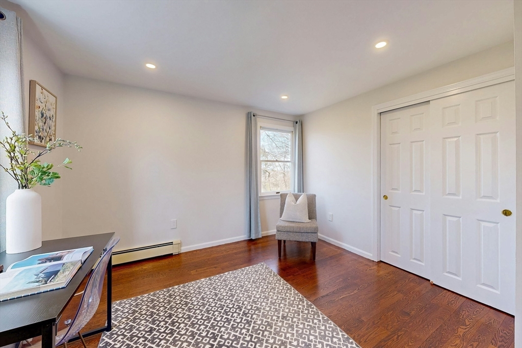 1 Hodge Road Arlington, MA 02474 - Photo 28 of 39 a view of room with furniture and wooden floor
