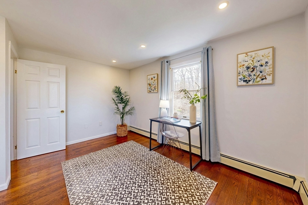 1 Hodge Road Arlington, MA 02474 - Photo 29 of 39 a living room with furniture and wooden floor