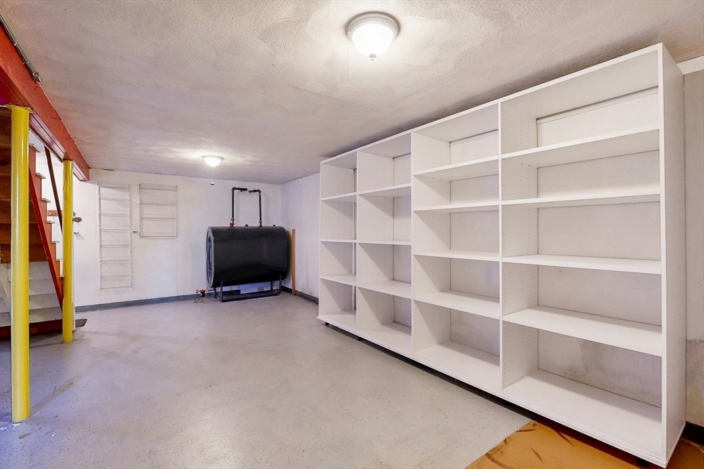 1 Hodge Road Arlington, MA 02474 - Photo 32 of 39 a view of an empty room with a window