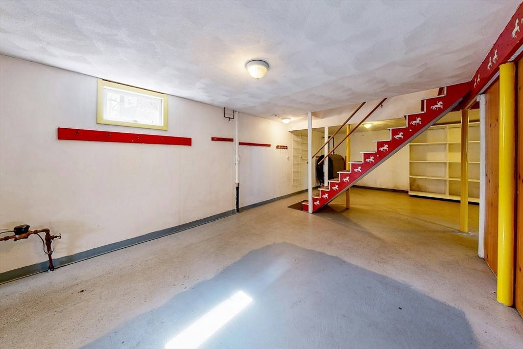 1 Hodge Road Arlington, MA 02474 - Photo 33 of 39 a view of an empty room with stairs