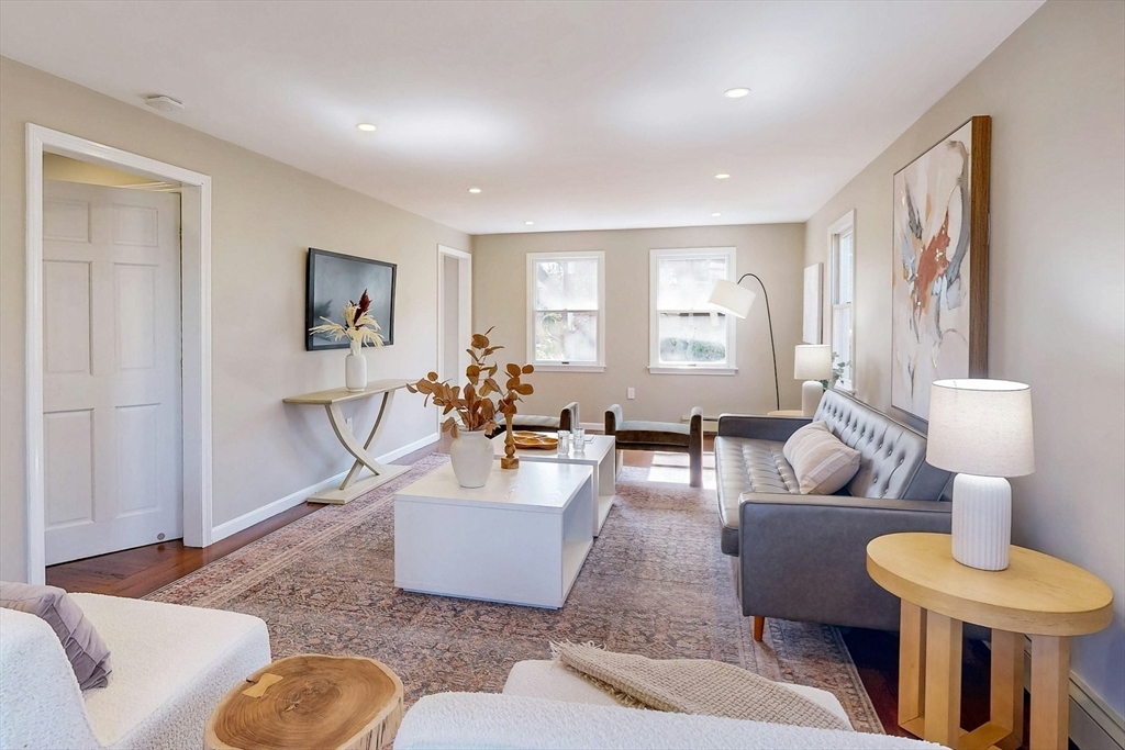 1 Hodge Road Arlington, MA 02474 - Photo 6 of 39 a living room with furniture and a wooden floor