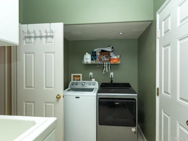 a kitchen with a stove and a sink