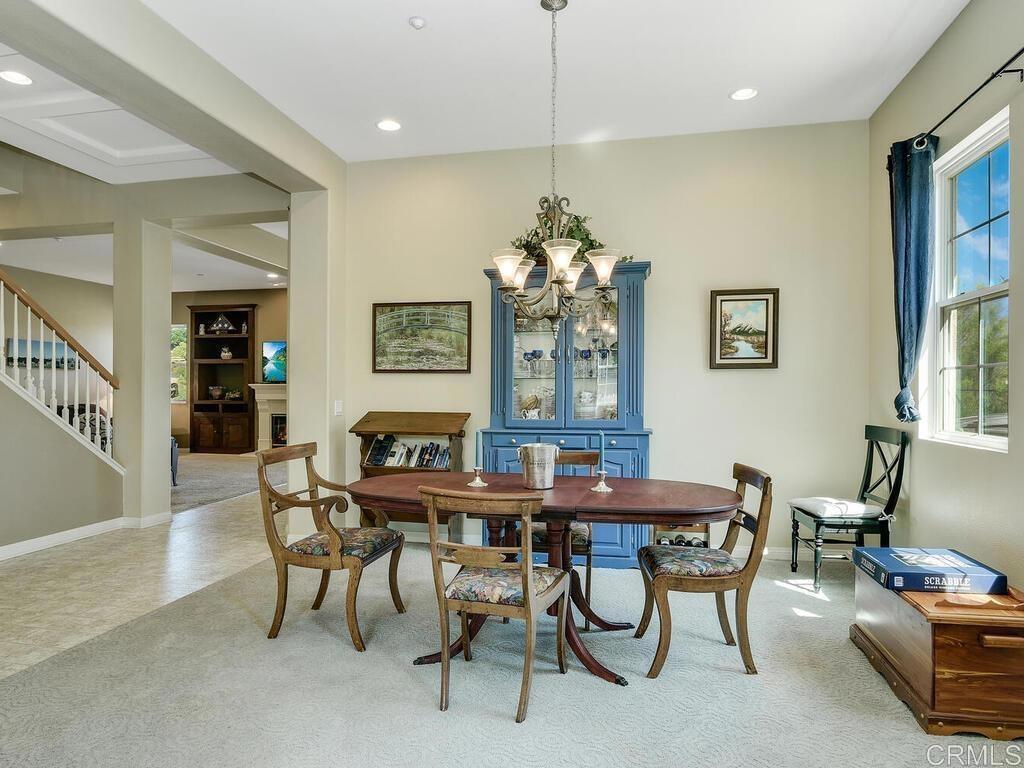 190 Mission Oaks Road Fallbrook, CA 92028 - Photo 10 of 50 a view of a dining room with furniture and chandelier
