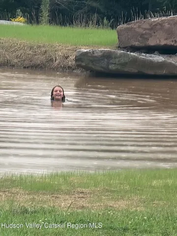 a room with gym equipment and a large window