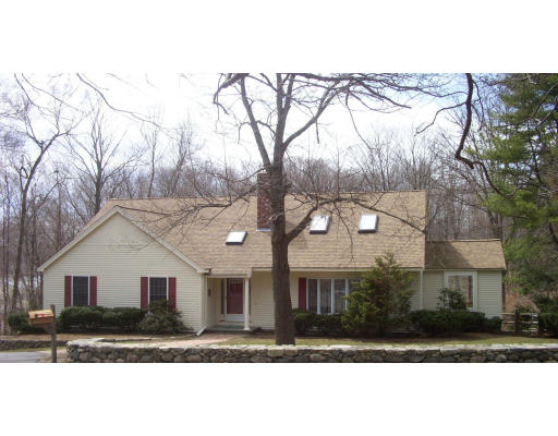 576 Grove Street Framingham, MA 01701 - Photo 1 of 8 a front view of a house with a yard