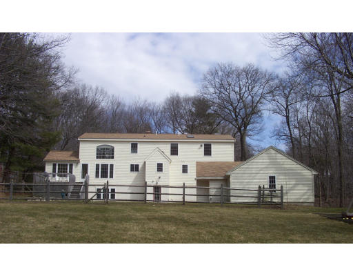 576 Grove Street Framingham, MA 01701 - Photo 2 of 8 a view of house with a yard