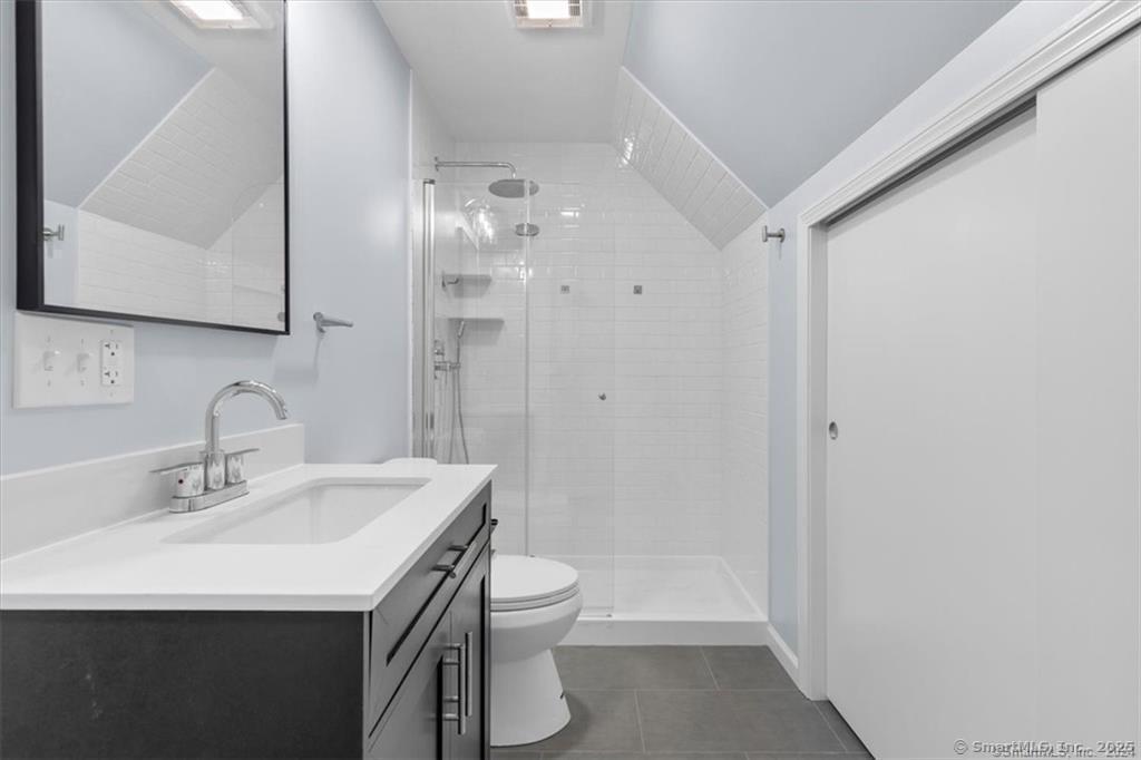 55 Admiral Street, Unit 2 New Haven, CT 06511 - Photo 22 of 35 a bathroom with a sink a toilet and shower